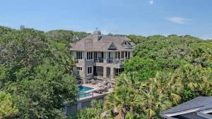 an aerial view of a large house with a swimming pool at 338 Surfsong in Kiawah Island