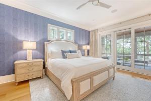 a bedroom with a large bed and a window at 68 New Settlement in Kiawah Island +72 photos