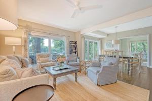 a living room with a couch and a table at 4925 Green Dolphin in Kiawah Island
