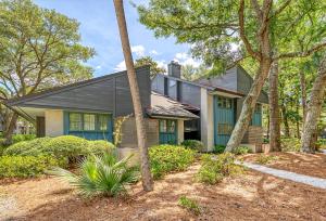 a house with green doors and trees at 4925 Green Dolphin in Kiawah Island