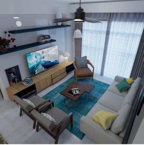 a living room with a couch and a tv at Luxora Hotel Lodwar in Lodwar