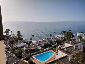 an aerial view of a resort with a swimming pool at Sun and ocean in San Bartolomé