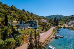 an aerial view of a river with a house at Luxury Seafront Villa Aman Korcula with Pool in Korčula