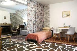 a bedroom with a bed and a living room at Nice house close to the sea in Mati +62 photos
