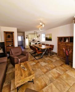 a living room with a couch and a table at Strandstr_ in Zingst