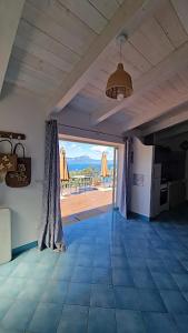 an empty room with a view of a patio at Sanacore - Maratea - Cersuta in Maratea