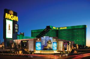 a group of buildings in a city at night at MGM Grand in Las Vegas