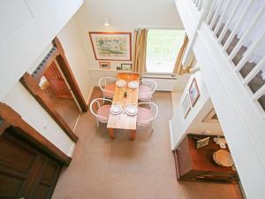 an overhead view of a living room with a table and chairs at Deer Park Lookout - E3928 in Thorpe Market