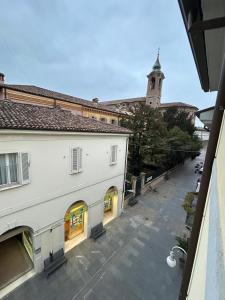 an overhead view of a building with a clock tower at Maison Cavallino in Lugo