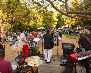 a group of people playing music at an outdoor concert at El Capitan Canyon in Capitan +113 photos