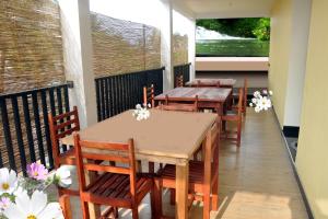 Restoran või mõni muu söögikoht majutusasutuses Hotel Pearl Gate