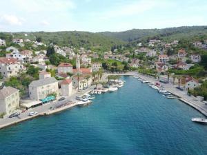 an aerial view of a town with boats in a river at Apartment Dora in Splitska