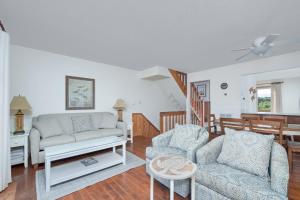 a living room with a couch and a table at 4205 - Schwartz in Duck