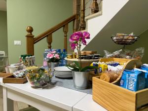 a table with a bunch of food on it at Re-Start in Scandolara Ravara +17 photos