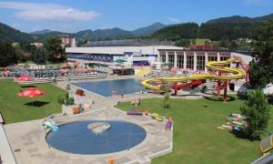 an amusement park with a water park with a slide at Becci Apartment-Free Parking in Kapfenberg