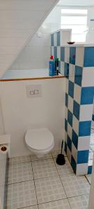 a bathroom with a toilet in a room at Ti Cactus Guadeloupe in Sainte-Rose +19 photos