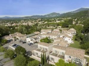 an aerial view of a residential neighborhood with houses at Le Mas du Mont Ventoux in Malaucène