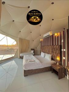 a bedroom with a large bed in a tent at Star night in Disah