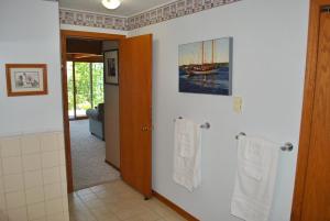 a bathroom with two towels hanging on a wall at Bayfield Island View Lodging, Bayfield, WI in Bayfield +74 photos