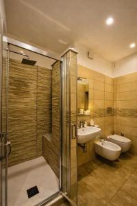 a bathroom with a shower and a sink and a toilet at Floral Holiday in Minori +31 photos