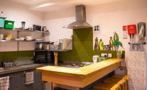 a kitchen with a sink and a counter top at Igloo Hybrid in Nottingham