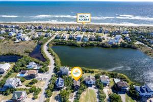 an aerial view of a resort with a sign at 8194 - Southern Grace in Waves