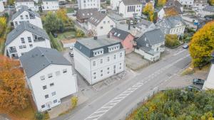 an aerial view of a city with houses and a street at Modernes Studio im Zentrum mit Parkplatz in Gummersbach