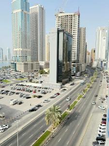 a highway in a city with cars on it at A luxurious room with a breathtaking view in Sharjah