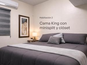 a bedroom with a large bed in a room at Casa Pradera in Manuel F. Martínez