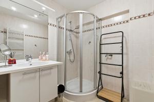 a bathroom with a shower and a sink at Walter Vilain 0301 G in Sint-Idesbald