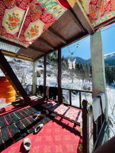 a room with a view of a snow covered mountain at Mj s Home in Kalgha