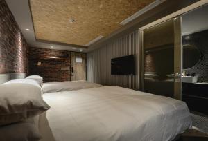 TV a/nebo společenská místnost v ubytování City Suites - Kaohsiung Pier2