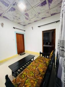 a room with a bed in a room at The Grand Residence in Ella