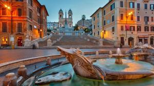 a statue of a boat in the middle of a street at B&B Vatican's Keys in Rome