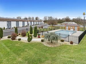 an aerial view of a building with a swimming pool at Spark by Hilton Abingdon I-81 near Fairgrounds in Abingdon