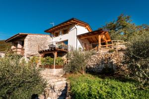 a house on the side of a mountain at Albergo Diffuso Forgaria Monte Prat in Forgaria nel Friuli