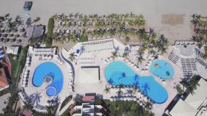 an aerial view of a resort with two pools at Occidental Nuevo Vallarta - All Inclusive in Nuevo Vallarta