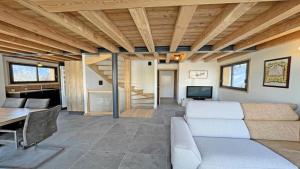 a living room with a couch and a table at Chalet - Superbe Chalet 12 pers MAE-2644 in Les Prés