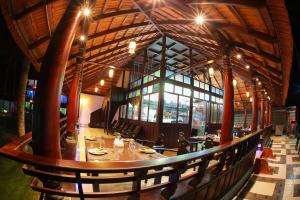 a dining room with a table in a building at SUN VIEW Beach Resort in Varkala