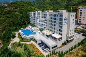 an aerial view of a hotel with a swimming pool at Status-M Apartments 112 in Bečići