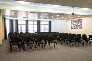 a large room with a bunch of chairs in it at SPA Hotel Infinity Park Velingrad in Velingrad +136 photos