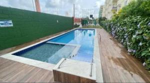 a large swimming pool on top of a building at Condomínio Aurora in Paulista