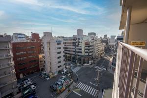 an aerial view of a city with buildings and a street at b&新大阪店 in Osaka