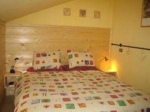 A bed or beds in a room at B&B Al Calicanto