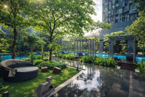 a rendering of a park with a pool and trees at klcc Star residence Kuala Lumpur in Kuala Lumpur