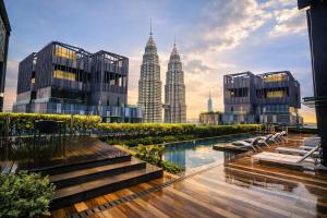 a view of the petronas twin towers from a city at klcc Star residence Kuala Lumpur in Kuala Lumpur