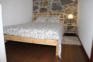 En eller flere senger på et rom på Quinta da Costa