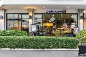 a store front of a building with a sign on it at Kantary Hotel Ayutthaya in Phra Nakhon Si Ayutthaya