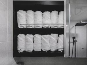 a bunch of rolls of toilet paper on a shelf at Seoul 3R,4B,2BA,All rooms AC, 지하철도보5분, 동대문15분, 명동25분, 이태원,성수,서울역 30분 in Seoul +30 photos