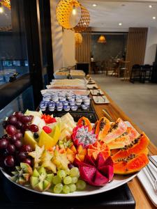 a table with a bunch of different types of food at Kastel Petrópolis in Petrópolis